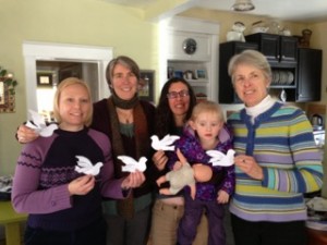 Advocacy Committee members Kara, Catherine, Gabriela, Lily, and Harriet stand in solidarity with those working for peace and justice in Columbia